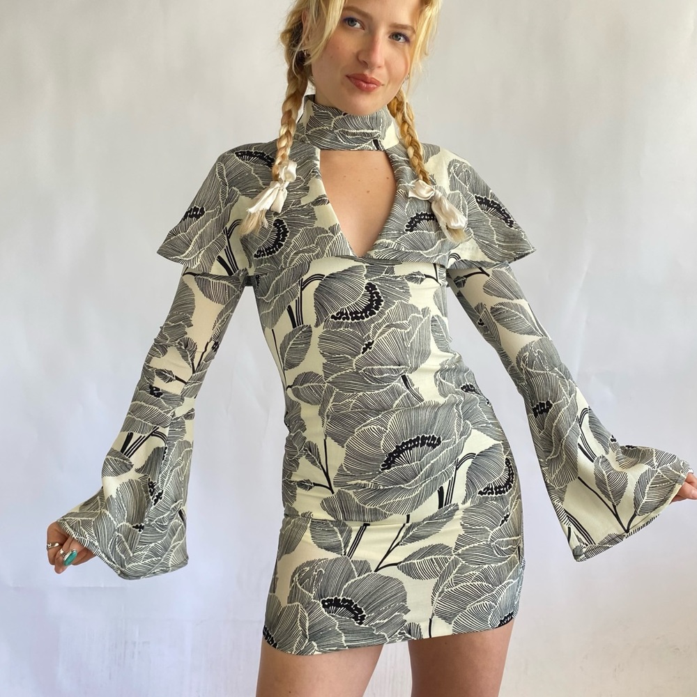 Floral high neck bell sleeve mini dress by Elliatt